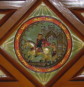 Plaque depicting St Martin, the ceiling of the Court Room, Maison Dieu. 