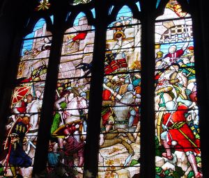 Relief of Dover Castle by John de Pencester 1216 depicted in a windown in the Stone Hall, Maison Dieu. Alan Sencicle