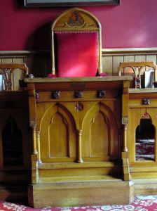 The presiding chair and in front, the Flashman lectern in the former Council Chamber where Inspector North would have sat. AS