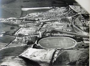 Crabble cricket ground with the new football pitch, constructed by the unemployed 1929-1930, nearer the camera. Dover Library