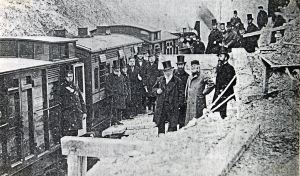 Opening of the SER Folkstone-Dover Line after a cliff fall in 1877. Watkin, the Chairman of LCDR is wearing the Cossack style hat. Dover Library