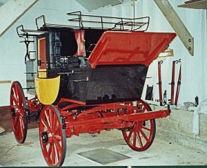 Wheels fitted onto body of the coach in the process of being restored. Courtesy of Tony Newton