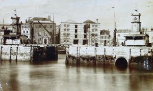 The Bason later Granville Dock entrance with Compass Tower on left and the Clock Tower on right. Dover Library