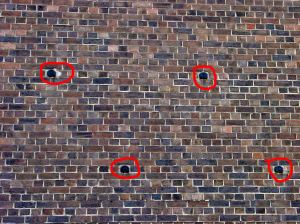 Lukey's Gin bottles used instead of tile,  adjacent to the Townwall Street entrance opposite Swimming Pool. Alan Sencicle 2009