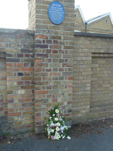 Bouquet of flowers laid in Memory of those killed and injured in the Crabble Tram Accident by David and Alan Bissenden below the Dover Society Plaque on the bridge that crosses the Dour where the accident happened. A Sencicle