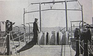 Sheaves and paying-out gear on the bow of the Dominia Cable ship c1930. AS Collection