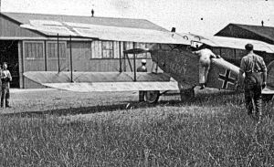 Swingate Aerodrome. A captured German aeroplane being examined. Dover Museum