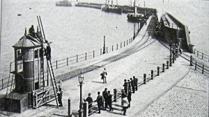 TAdmiralty Pier c1890 with a Sterling engine on the line. Note shutters on signal box. Bob Hollingsbee collection, Dover Museum