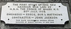 Prince of Wales Pier Foundation Stone first laid 20 July 1893 relaid 1954 to replace the original badly damaged during World War II. LS