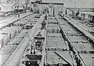 Block making for Admiralty Pier - Concrete poured into wood moulds that opened at side when set. Courtesy of DHB