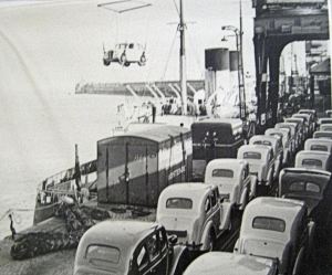 Admiralty Pier - Cars being hoisted onto ship for export. Dover Transport Museum