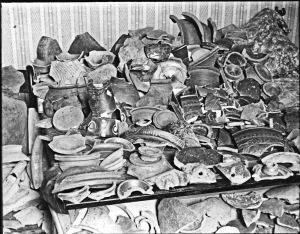 'Rubbish' found while excavating for Lloyds Bank on the north side of Market Square in 1908. Identified by Eugene Amos - who took the photograph - of archaeological significance. Dover Museum