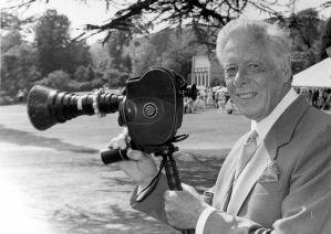 Photographer Ray Warner, Chairman of the Dover Players, filming one of the many productions staged by the company in Kearsney Abbey. Dover Museum