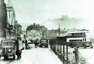 World War II - Snargate Street, note the East Kent Road Car Company bus on the right. Dover Transport Museum