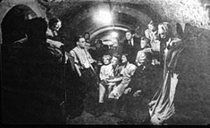 World War II. Being entertained in one of the underground caves in 1940. Dover Museum