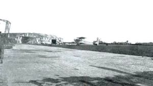 Guston Aerodrome off Deal Road. Duke of Yorks school clock tower can be seen. Dover Transport Museum