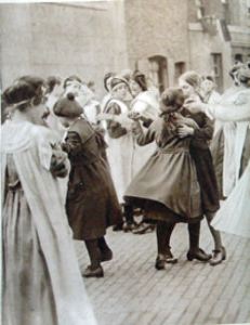 Dancing in the street when peace was declared on 11 November 1918. Doyle collection