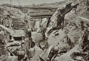 Scene from the Trenches, a soldier keeps watch while his exhausted colleagues sleep. Ovilliers