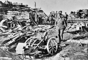 WWI German machine guns and trench mortars captured at Gheluvelt 31 October 1914 in front of a German pill-box. Wikimedia