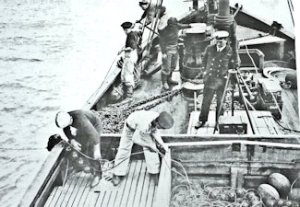 Drifter at Work showing glass floats that were used in the Dover barrage. D Library
